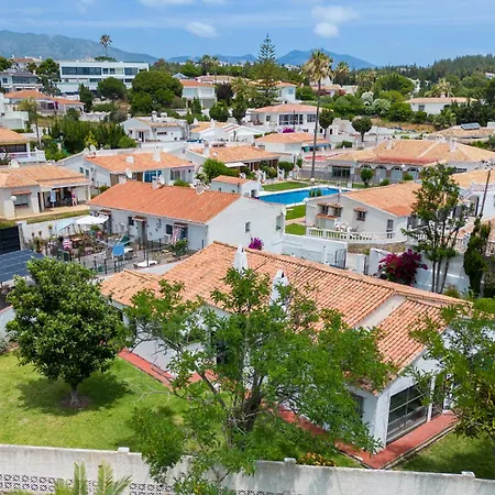 Family With Garden Next To The Villa El Faro